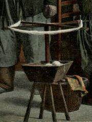 Close-up of 19th century Dutch swift, painted to look like a woman holding a baby